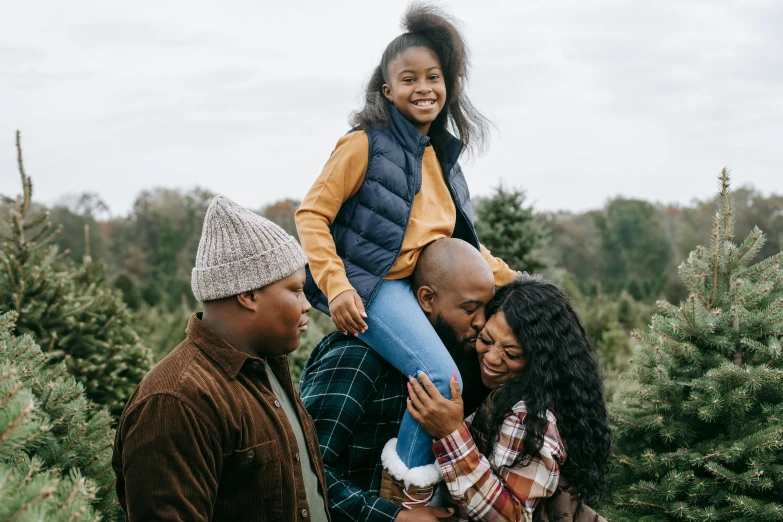 a family at a christmas tree farm, pexels contest winner, incoherents, black people, avatar image, happy and beautiful, stacked image