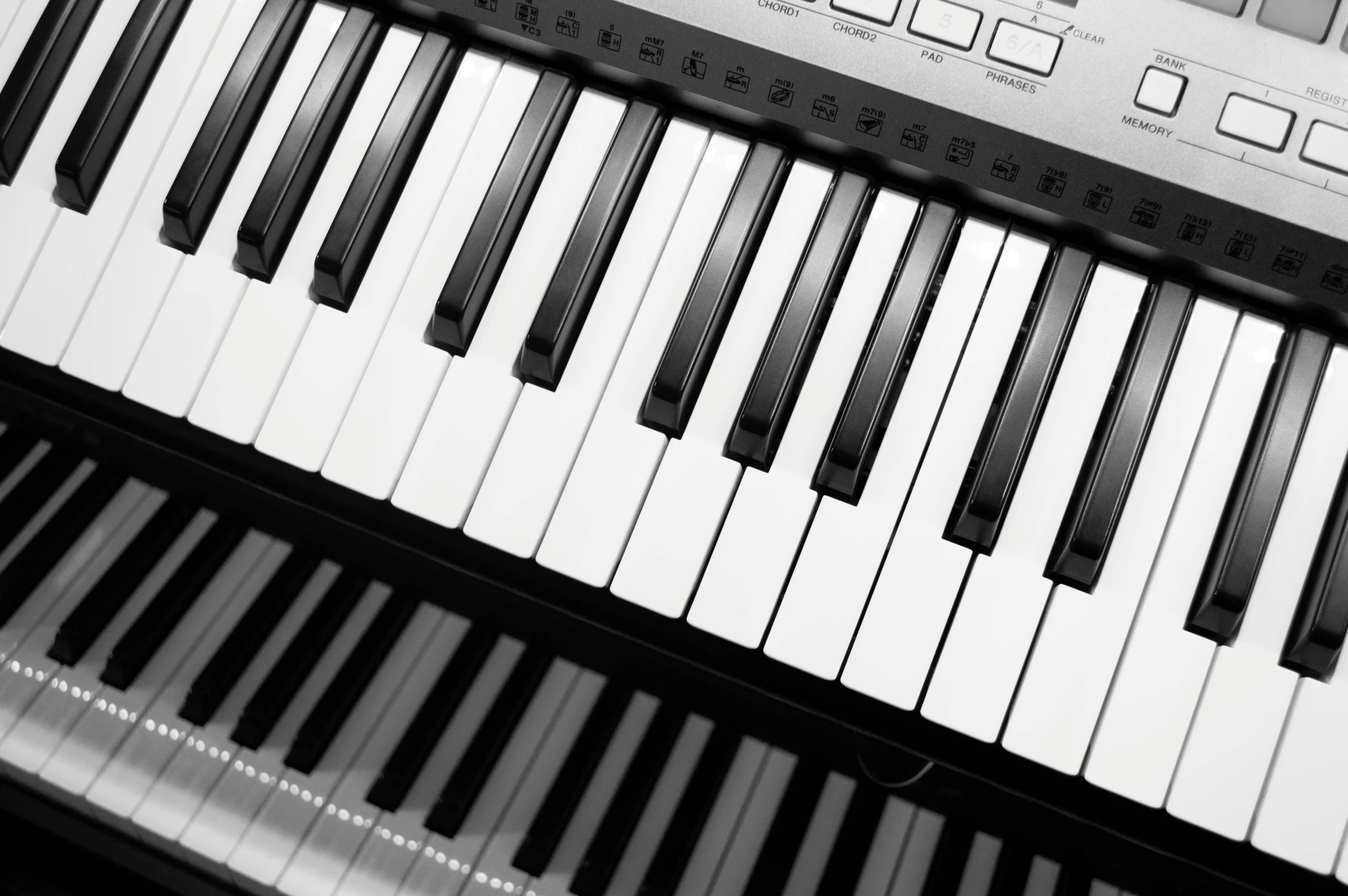 a black and white photo of a keyboard, by Jan Kupecký, computer art, audio equipments, stockphoto, composer, real photo