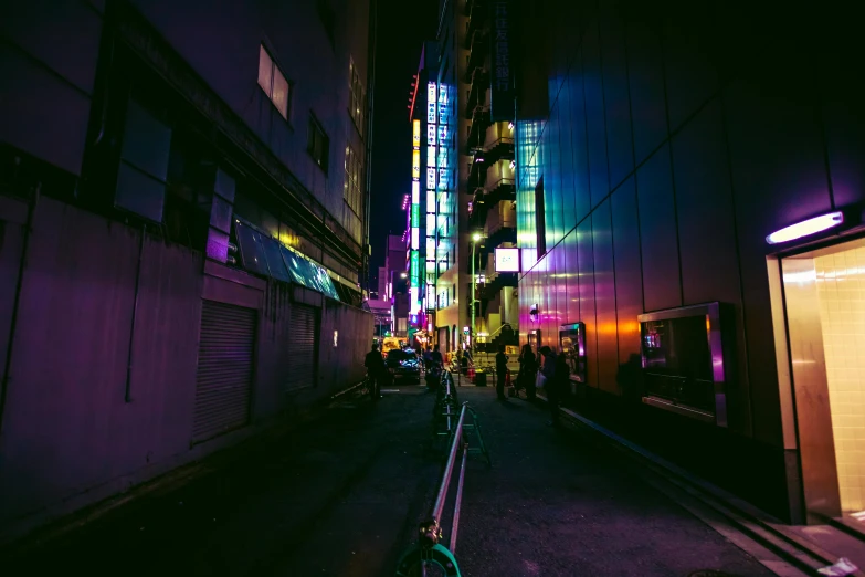 a city street filled with lots of tall buildings, inspired by Elsa Bleda, unsplash contest winner, japanese neon signs, purple and blue neon, instagram picture, alley