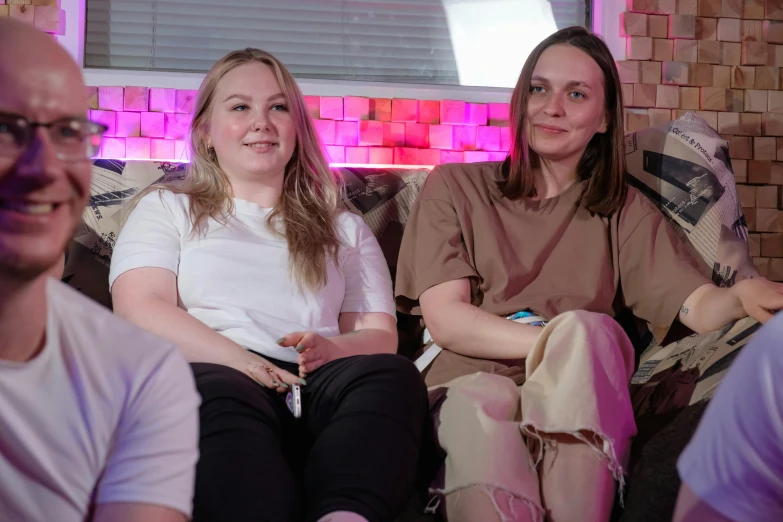 a group of people sitting on top of a couch, kirsi salonen, greta thunberg smiling, avatar image