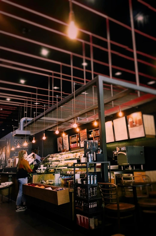 a store filled with lots of different types of food, pexels contest winner, conceptual art, dark cables hanging from ceiling, aussie baristas, profile image, illustrated starbucks interior