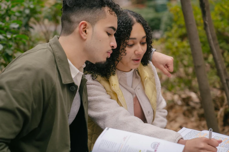 a man and a woman looking at a map, pexels contest winner, sydney park, looking her shoulder, pokimane, teaching