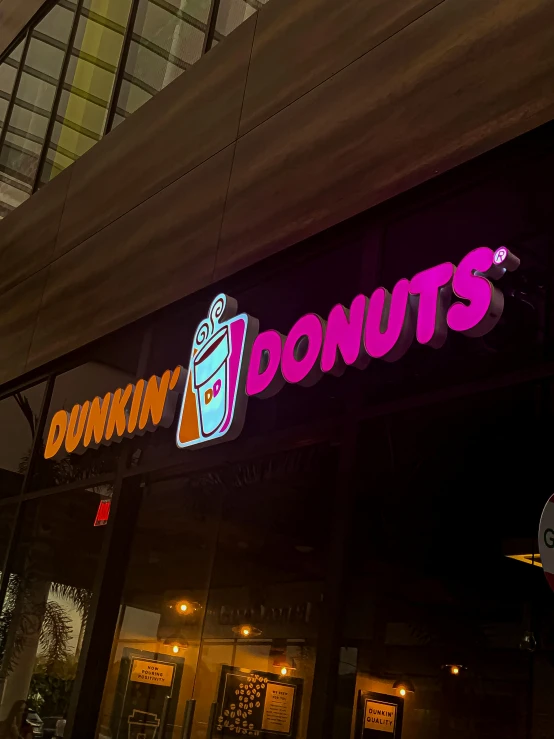 a neon sign in front of a donut shop, a photo, reddit, 2 5 6 x 2 5 6 pixels, giants, 🎀 🧟 🍓 🧚, the windows are lit