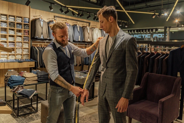 two men standing next to each other in a clothing store, pexels contest winner, renaissance, grey suit, working, measurements, felix englund