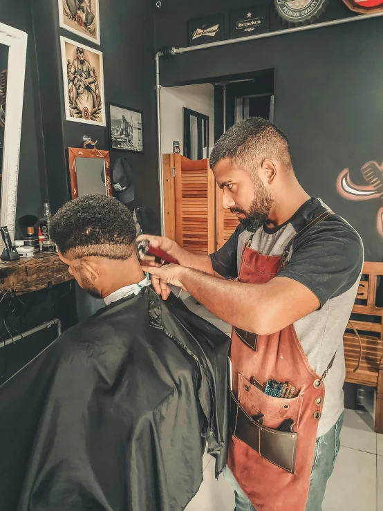 a man cutting another man's hair in a barber shop, pexels contest winner, profile image, brown skin man egyptian prince, thumbnail, a handsome man，black short hair