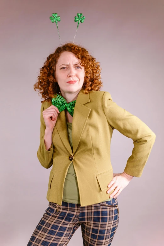 a woman with red hair and a green bow tie, dressed in 1970s menswear, outfit photograph, modeled, rebecca sugar