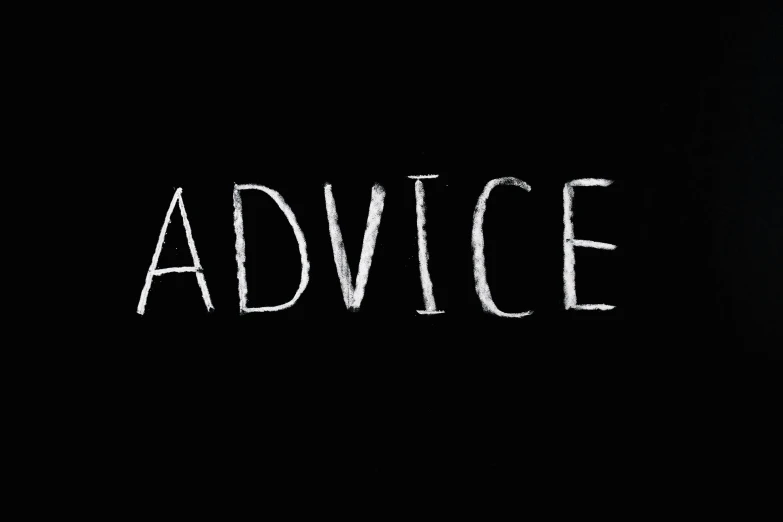 the word advice written in white chalk on a black background, an album cover, by Robert Adamson, indie video game horror, 👰 🏇 ❌ 🍃, sitting down, david lynch film