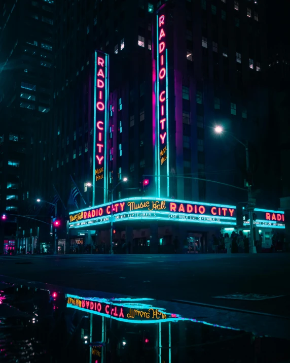 the marquee of radio city is lit up at night, an album cover, inspired by Elsa Bleda, unsplash contest winner, holography, profile picture 1024px, dark city, photo from 2022, instagram picture