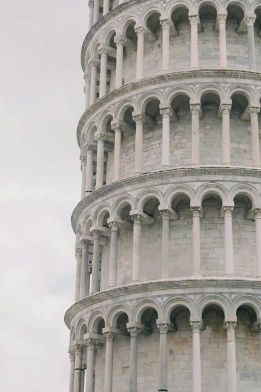 a tall tower with a clock on top of it, pexels contest winner, renaissance, pasta, marble white columns, telephoto vacation picture, spiral