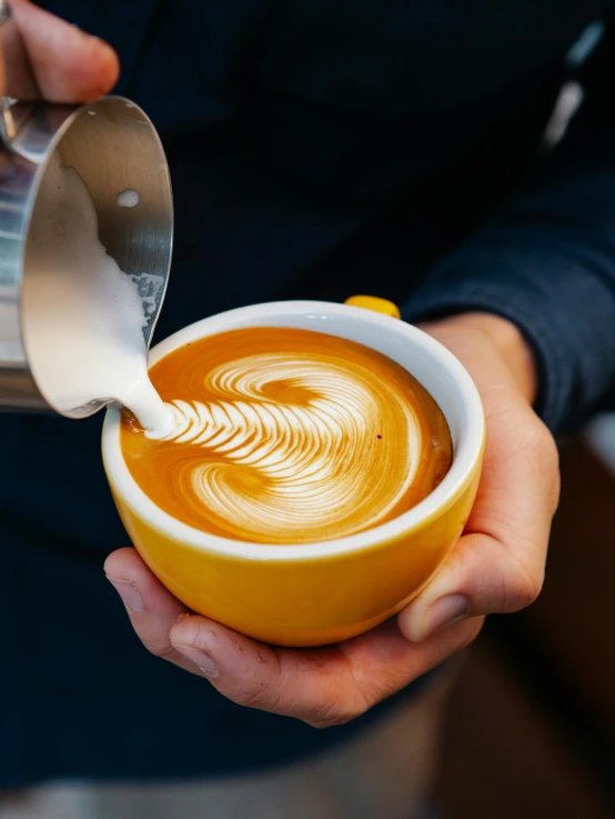 a person pouring milk into a cup of coffee, by Doug Ohlson, trending on unsplash, swirly, thumbnail, aussie baristas, no cropping