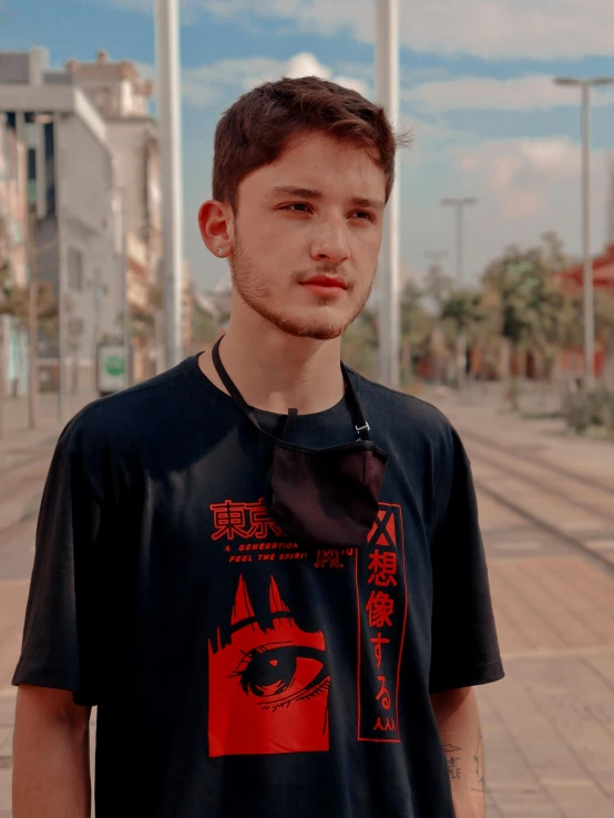 a young man standing in the middle of a street, an album cover, by Attila Meszlenyi, ((red)) baggy eyes, sao paulo, cai xukun, wearing a t-shirt