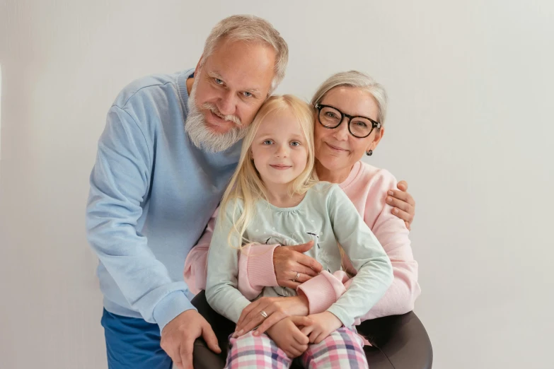 a man sitting on top of a chair next to a little girl, pexels contest winner, antipodeans, two old people, lovingly looking at camera, avatar image, white-haired