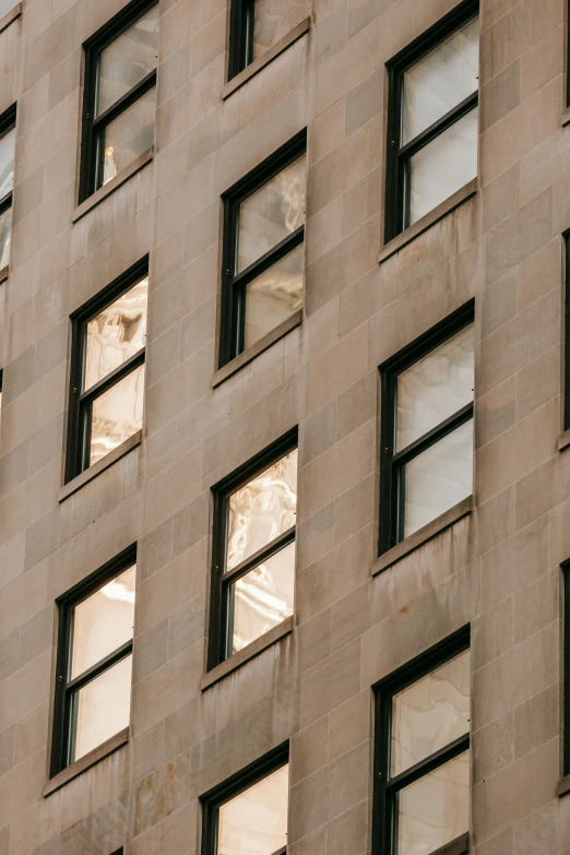 a clock that is on the side of a building, pexels contest winner, modernism, reflective windows, shiny layered geological strata, golden hour in manhattan, house windows