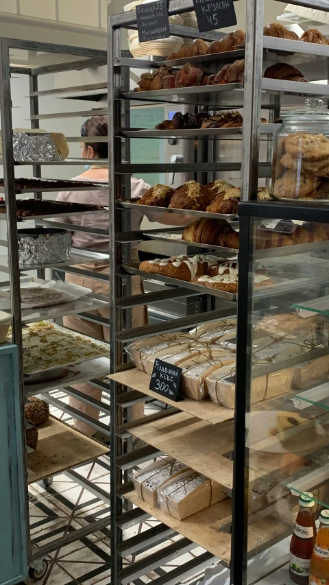 a display case filled with lots of baked goods, pexels, renaissance, 15081959 21121991 01012000 4k, square, panoramic shot, natural morning light