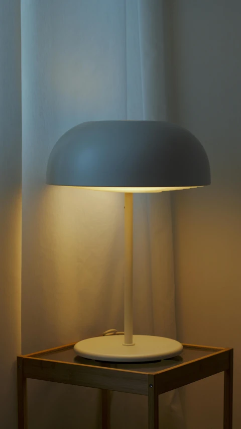 a lamp sitting on top of a table next to a window, round-cropped, soft coloured gel lighting, hexadome, graphite