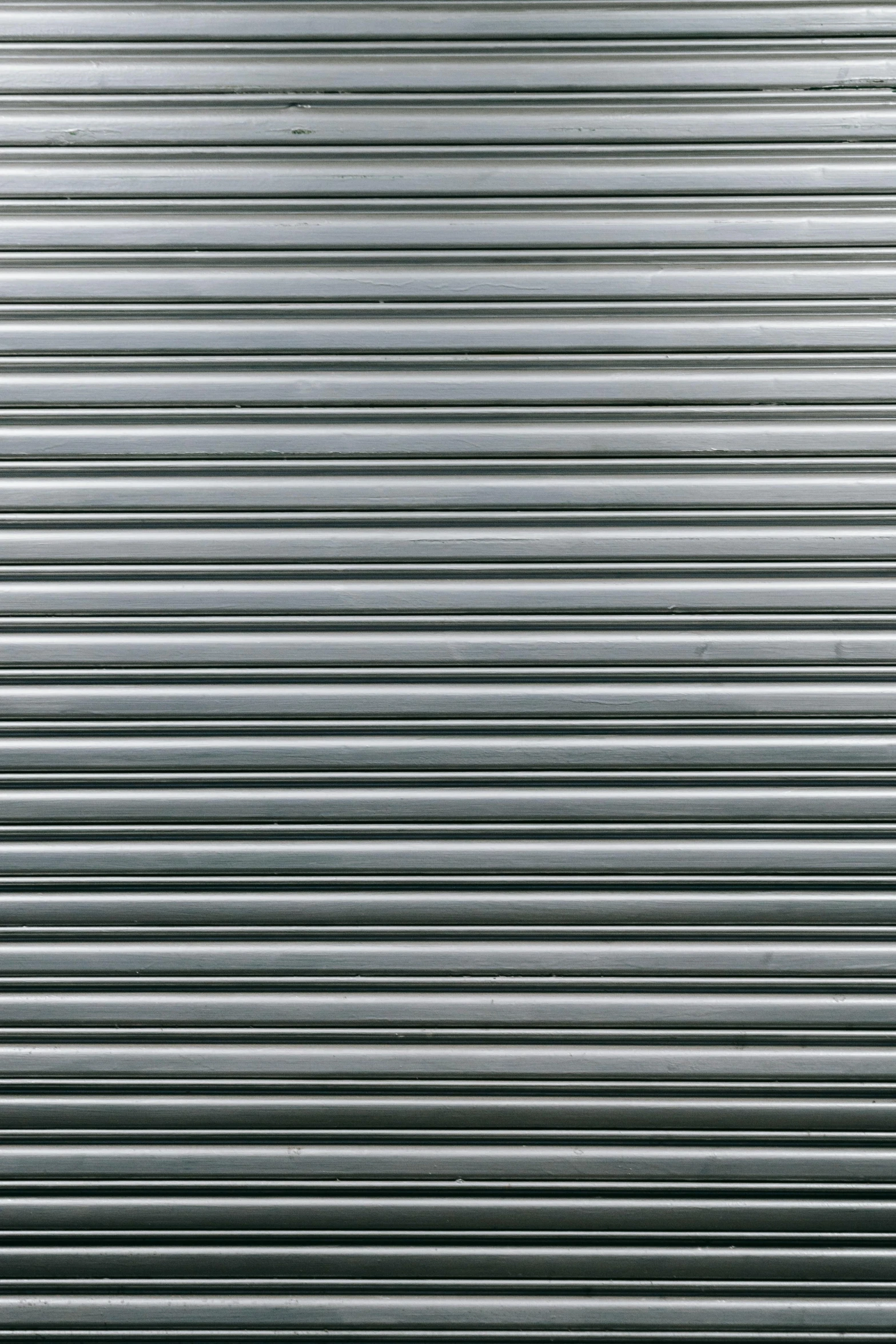 a red fire hydrant sitting in front of a metal door, inspired by Andreas Gursky, unsplash, op art, silver color, seamless, ffffound, striped