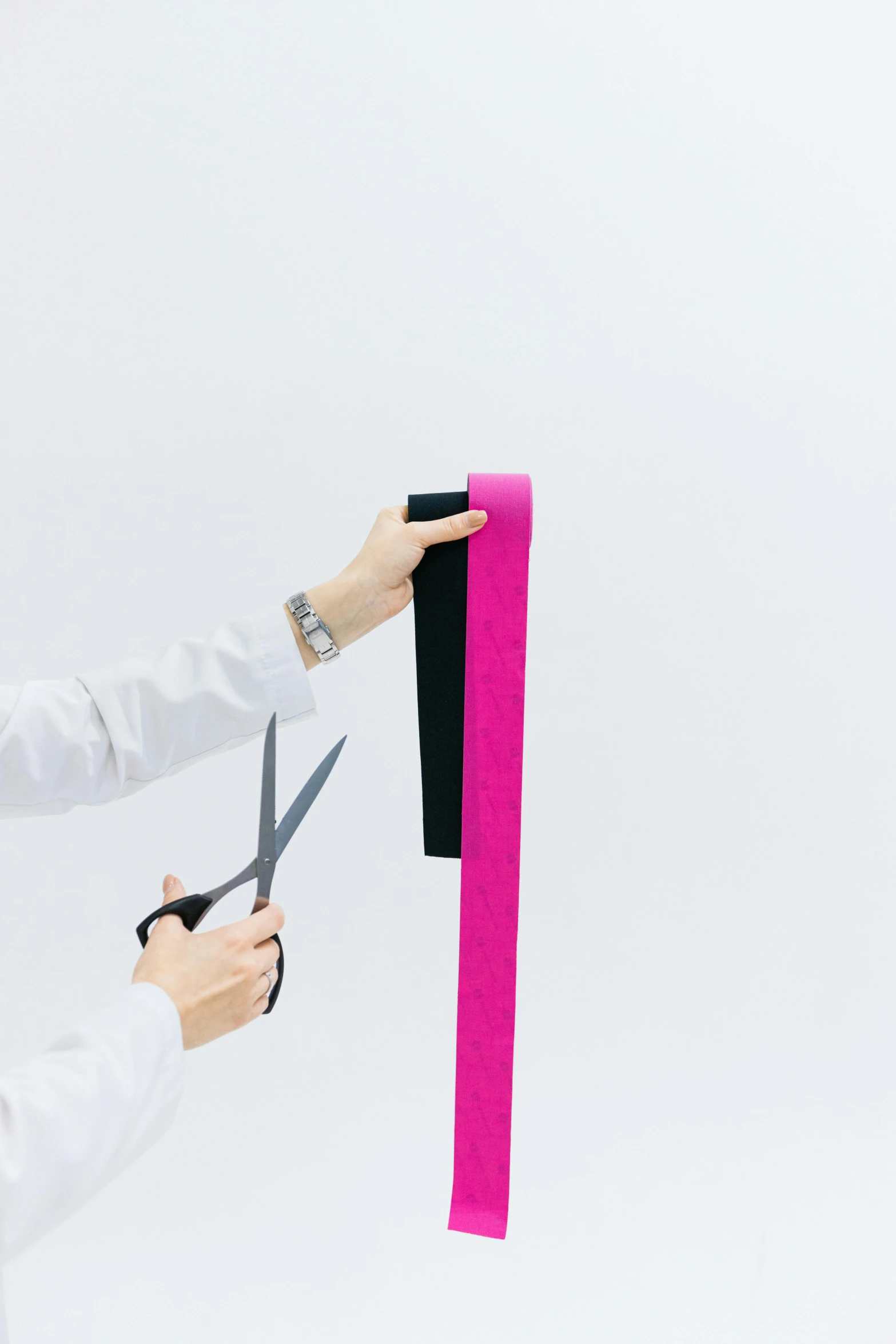 a woman cutting a pink ribbon with a pair of scissors, by Gavin Hamilton, unsplash, kinetic art, long view, wearing hakama, on a white background, assembly instructions