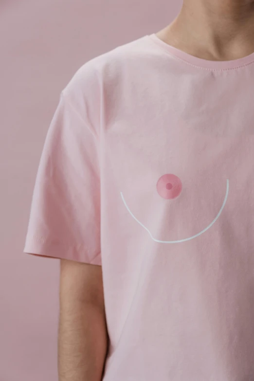 a man wearing a pink shirt with a smiley face on it, a picture, inspired by Shōzō Shimamoto, trending on unsplash, wavy lingeries, minimalistic aesthetics, maison ikkoku, hegre