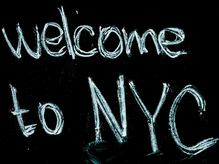 a chalkboard with the words welcome to nyc written on it, by Carla Wyzgala, cyan, explore, mid shot, thumbnail