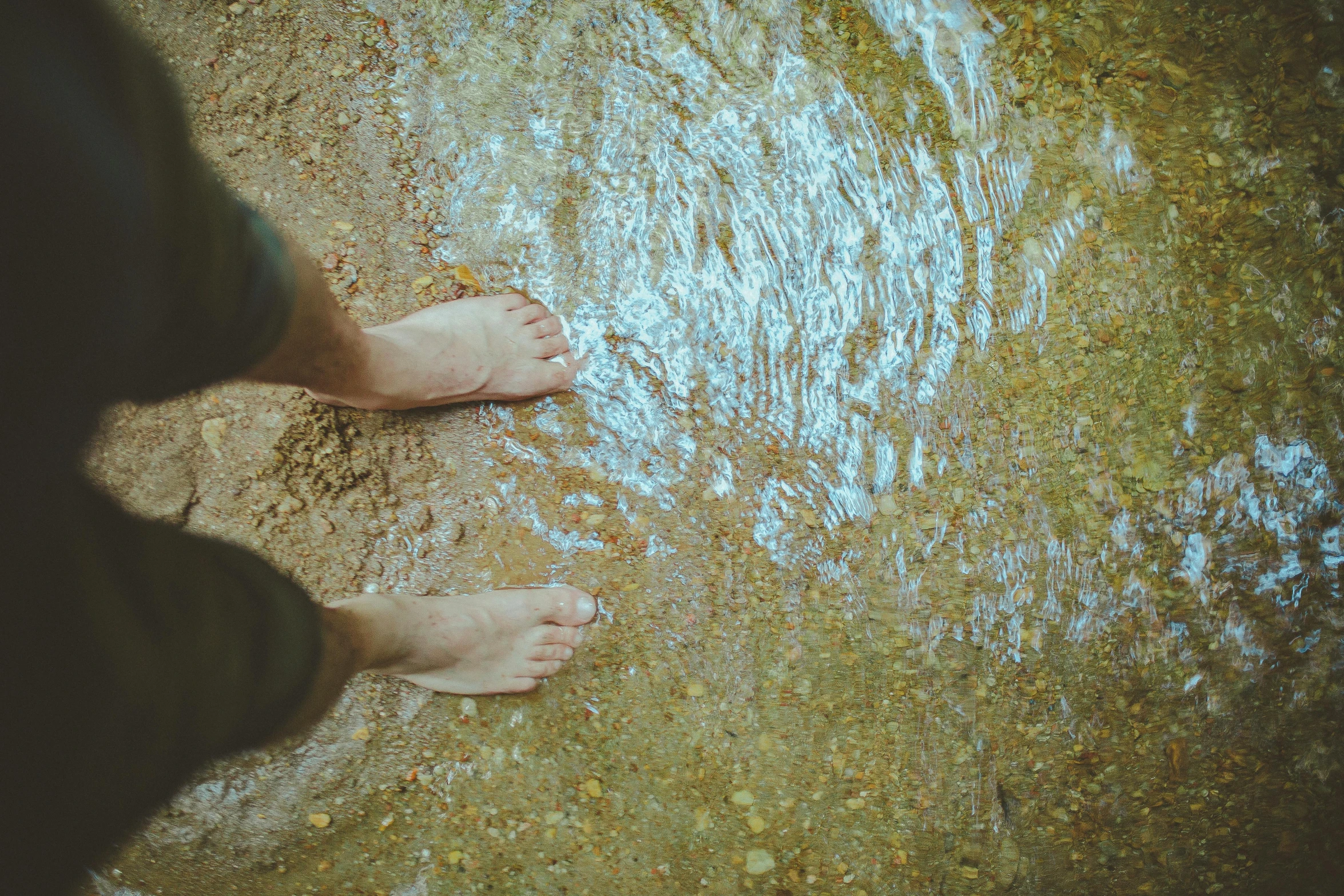 a person standing next to a body of water, unsplash, renaissance, wet feet in water, 15081959 21121991 01012000 4k, instagram post, heath clifford