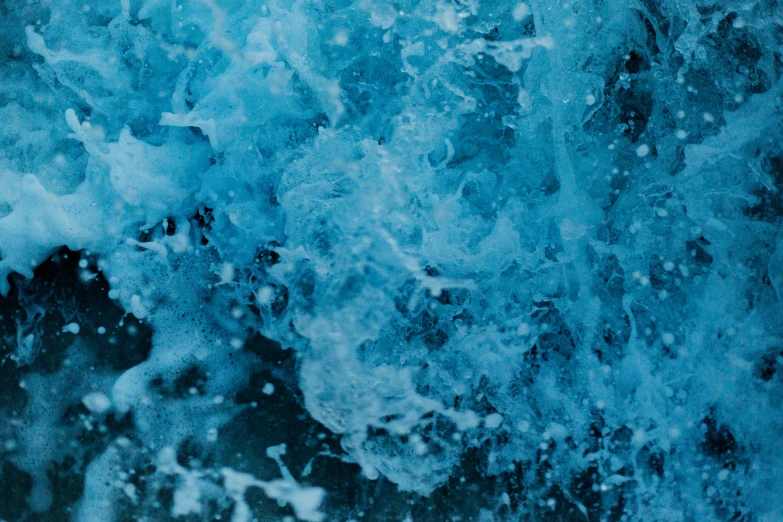 a man riding a wave on top of a surfboard, pexels, conceptual art, blue liquid and snow, jelly - like texture. photograph, avatar image, blue-fabric