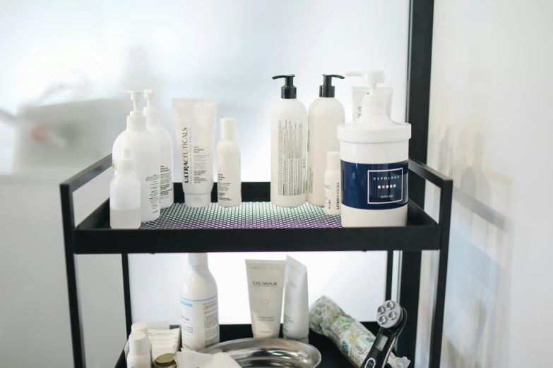 a shelf filled with lots of different types of skin care products, by Gavin Hamilton, purism, white room, scaled arm, extra details, gemma chen