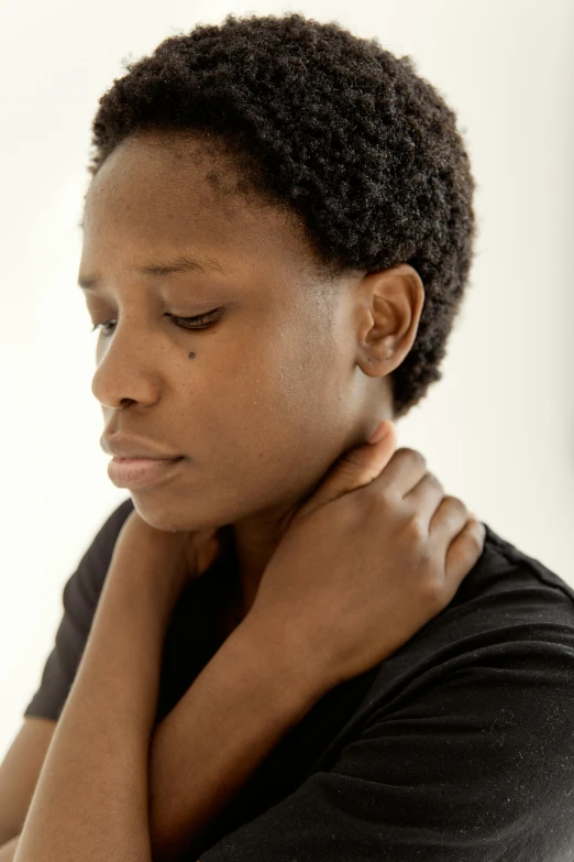 a woman holding her neck in pain, by Nina Hamnett, black young woman, profile image, multiple stories, fluffy neck