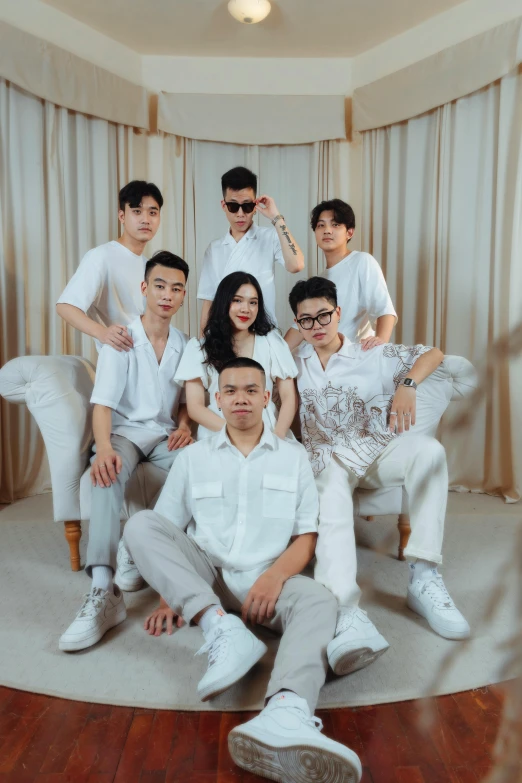 a group of people posing for a picture, an album cover, inspired by Gang Hui-an, pexels contest winner, milky white skin, duy beni serial, studio shoot, instagram picture