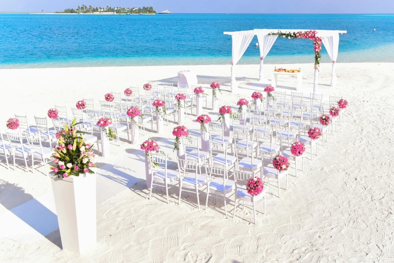 a wedding ceremony set up on the beach, pexels contest winner, in the colors hot pink and cyan, white background”, formal wear, white finish