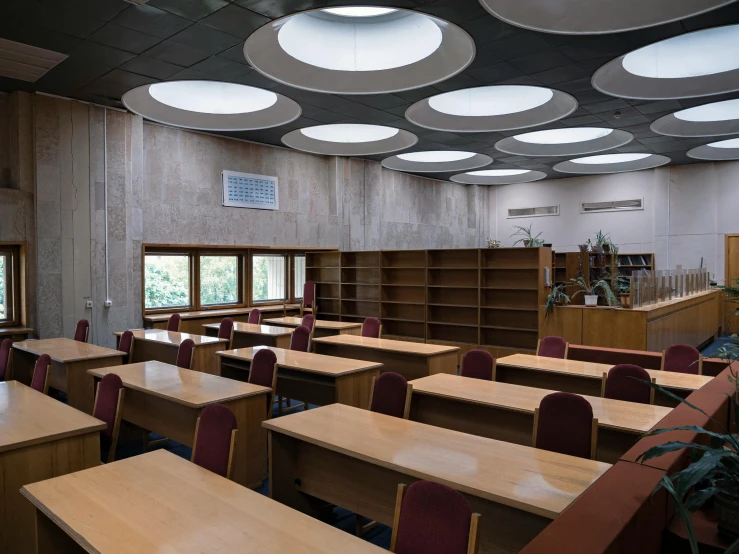 a room filled with lots of tables and chairs, by Yasushi Sugiyama, danube school, ceiling fluorescent lighting, old library, thumbnail, no - text no - logo