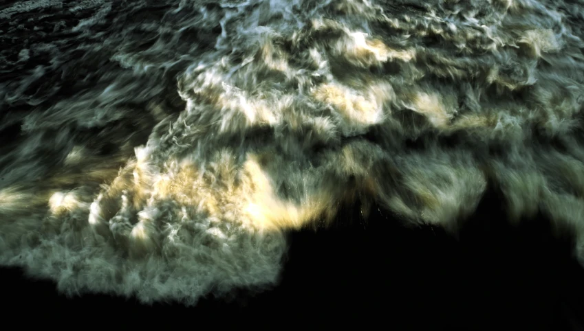 a man riding a surfboard on top of a wave, an album cover, inspired by Jan Rustem, unsplash, hurufiyya, bill henson, massive river, close-up from above, ignant