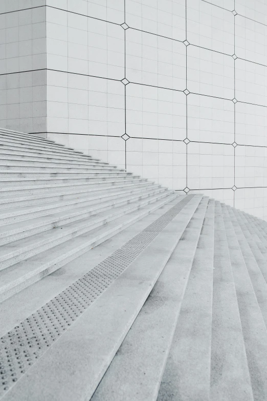 a man riding a skateboard down a flight of stairs, inspired by David Chipperfield, unsplash contest winner, postminimalism, made of all white ceramic tiles, detail structure, monochrome 3 d model, square shapes