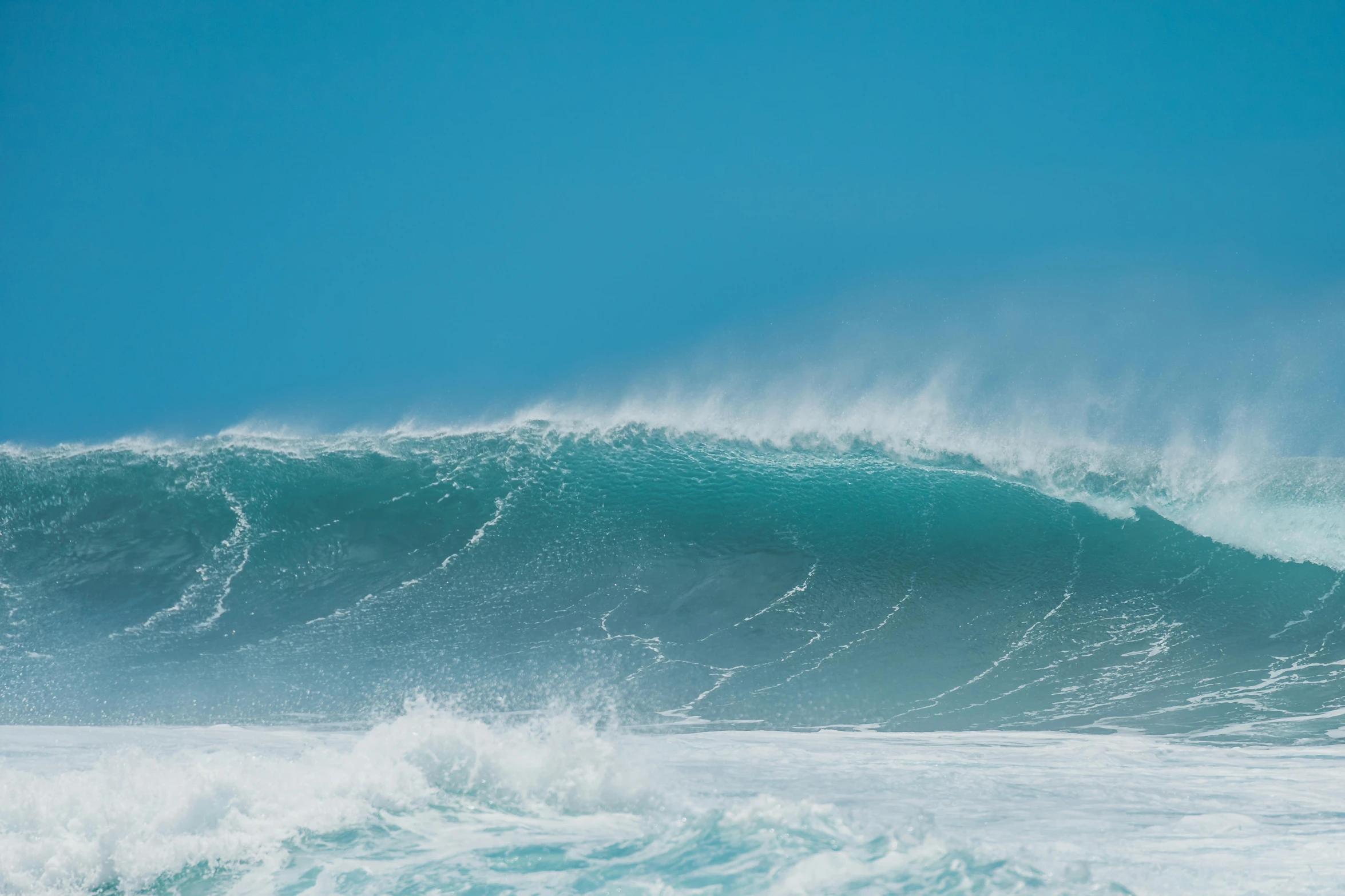 a man riding a wave on top of a surfboard, by Peter Churcher, pexels contest winner, renaissance, blue crashing waves, enormous scale, kauai, glistening seafoam