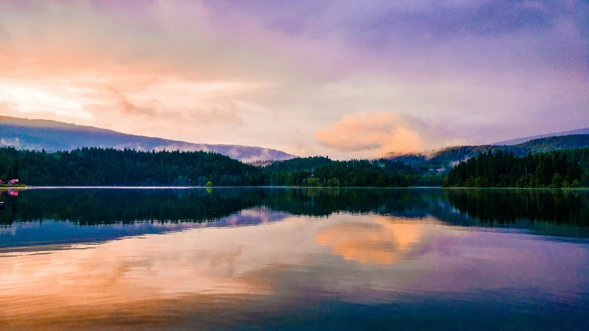 a boat sitting on top of a lake next to a forest, by Hazel Armour, pexels contest winner, romanticism, sunset panorama, pacific northwest, purple water, layers of colorful reflections