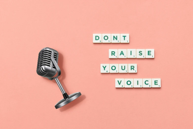 a microphone with the words don't raise your voice, trending on pexels, voxelart, inspirational quote, background image, society 6