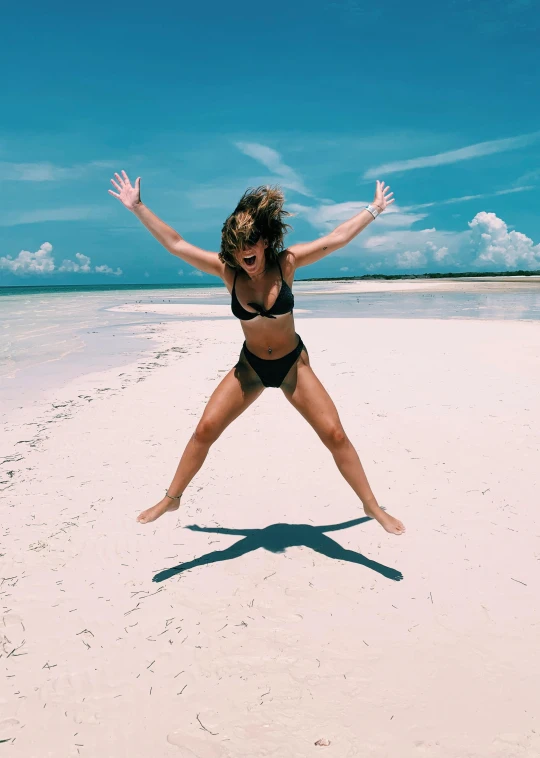 a woman jumping in the air on a beach, by Dulah Marie Evans, nina agdal, 30-year-old woman from cuba, wētā fx, insane quality