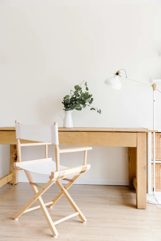 a chair that is sitting in front of a desk, trending on unsplash, light and space, white background, natural wood top, movies, home display