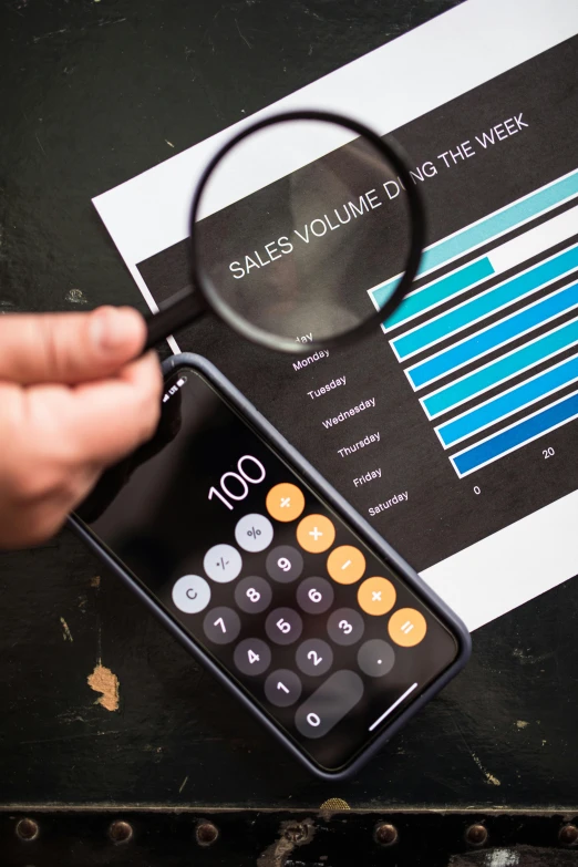 a person holding a magnifying glass over a calculator, a digital rendering, by Gavin Nolan, trending on unsplash, square, sales, analysis report, 8l