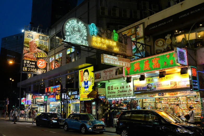 a city street filled with lots of neon signs, kakar cheung, exterior photo, black, yellow street lights