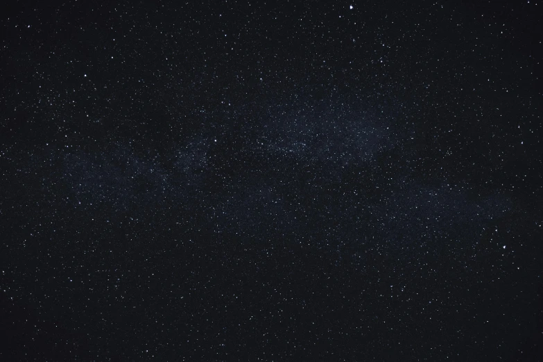 a dark sky filled with lots of stars, pexels, light and space, minimalist background, the milk way up above, background dark, minimalistic background