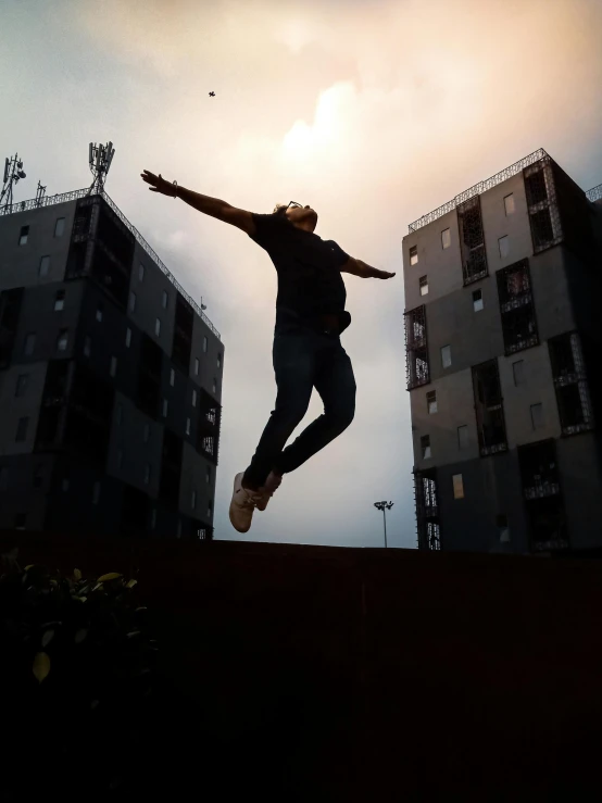 a man flying through the air while riding a skateboard, pexels contest winner, happening, standing on rooftop, parkour, award winning masterpiece photo, standing triumphant and proud
