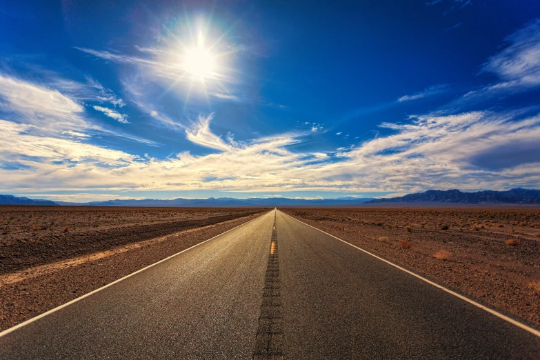 an empty road in the middle of a desert, an album cover, by Julia Pishtar, unsplash, fantastic realism, bright sunny day blue sky, sun - drenched, runway, youtube thumbnail