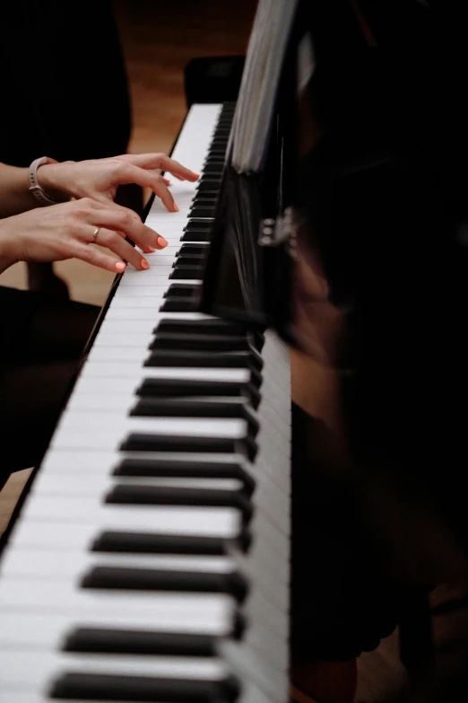 a close up of a person playing a piano, taken in the 2000s, promo image, ap, large)}]