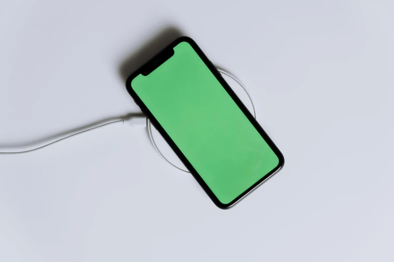 a close up of a cell phone with a green screen, trending on pexels, square, on a gray background, green energy, apple design