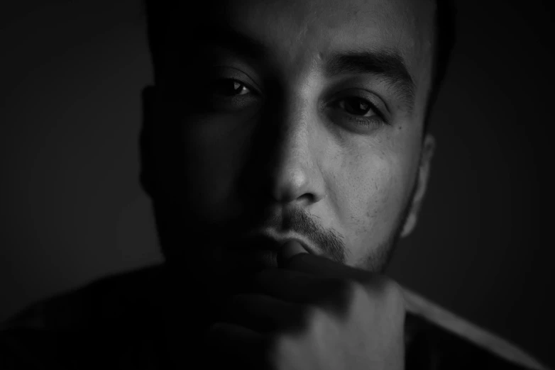 a black and white photo of a man brushing his teeth, a black and white photo, by Adam Marczyński, pexels contest winner, realistic face moody lighting, khyzyl saleem, portrait. 8 k high definition, portrait of a young italian male