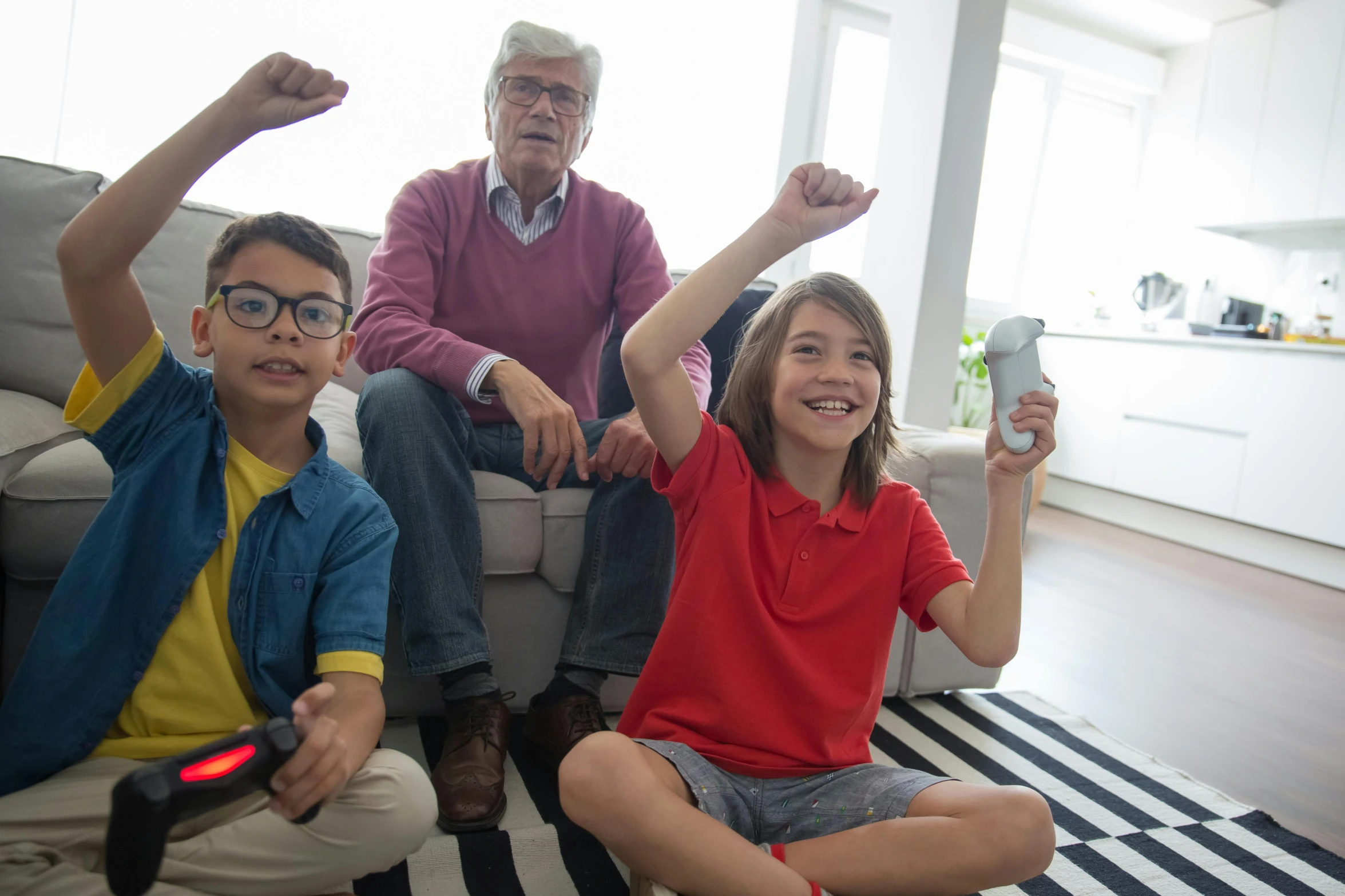 a group of people sitting on top of a living room floor, video game item, dad energy, older brother vibes, fists in the air