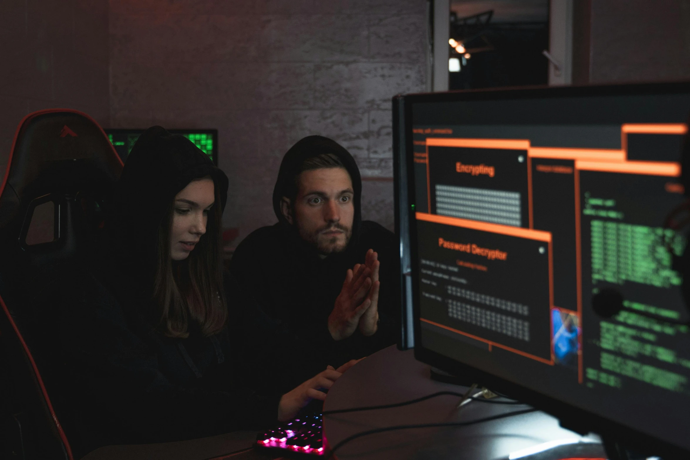 a couple of people sitting in front of a computer, dark setup, cryptoblades, hacking into the mainframe, trending photo