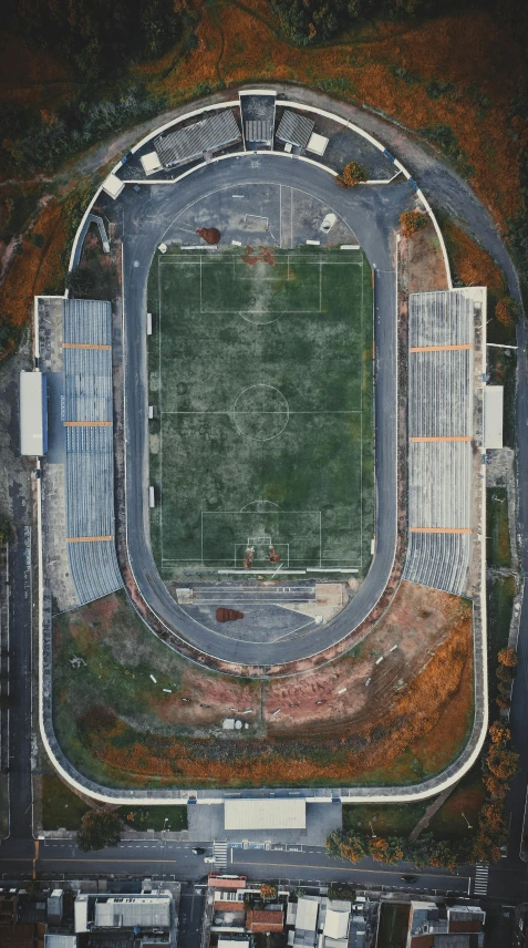 an aerial view of a soccer stadium, an album cover, by Attila Meszlenyi, unsplash contest winner, ffffound, greece, brutalist, 15081959 21121991 01012000 4k