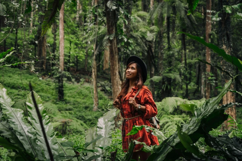 a woman standing in the middle of a forest, a portrait, by Julia Pishtar, sumatraism, avatar image