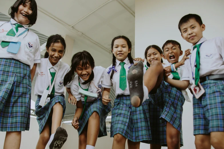 a group of young girls standing next to each other, pexels contest winner, ashcan school, standing on two legs, joy ang, avatar image, panorama shot